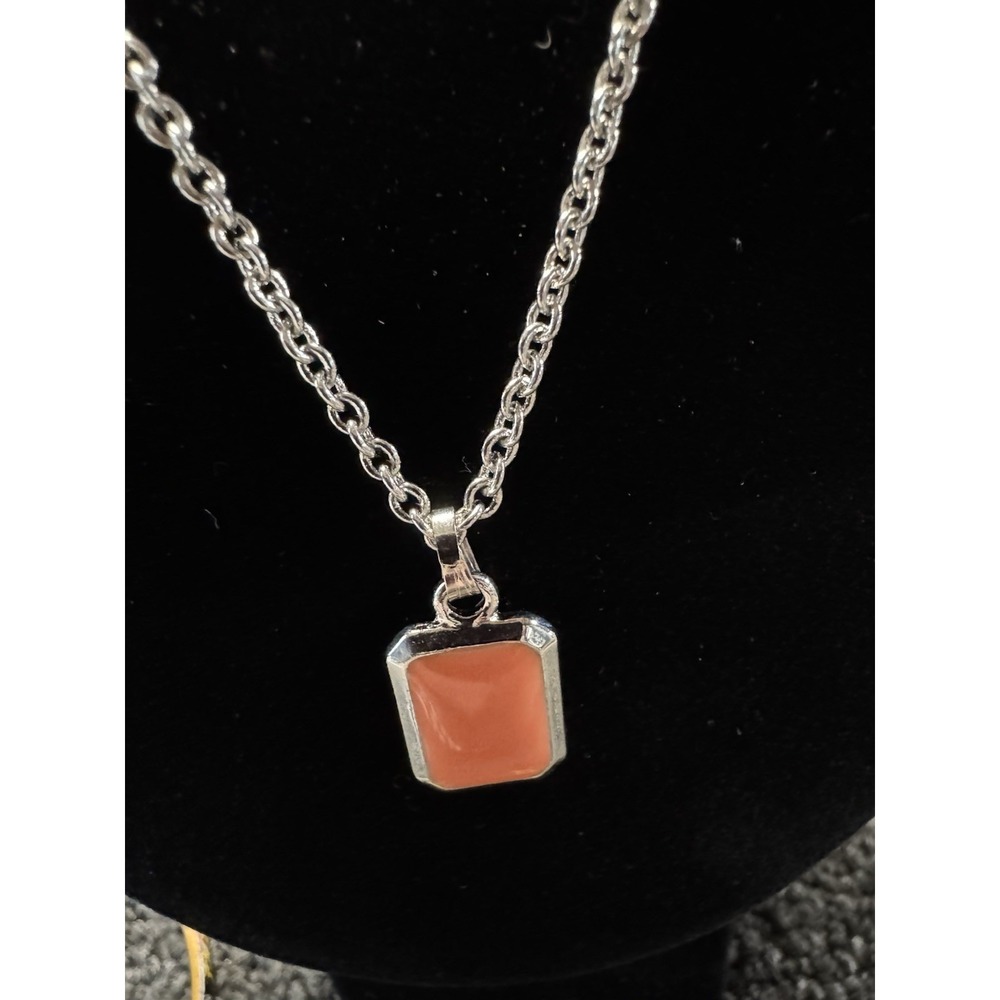 Emerald Cut Coral Colored Pendant In Silver Tone Chain